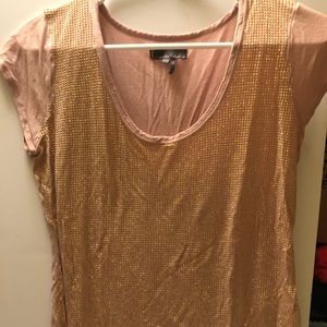 Coral top with gold accents
